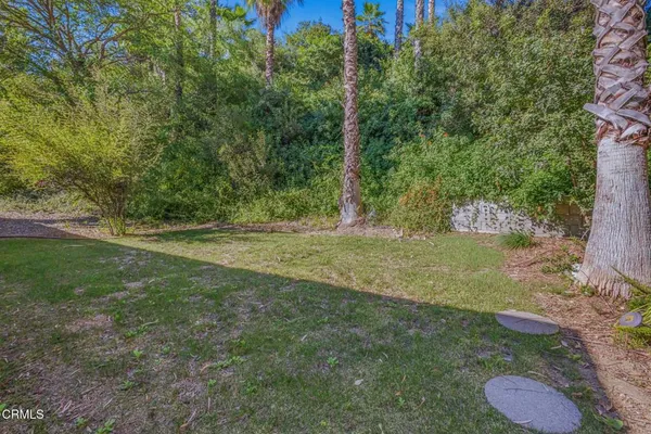a spacious bathroom with a tub shower and sink