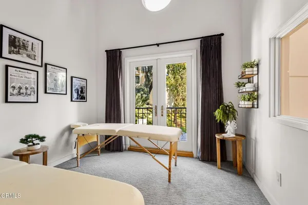 a view of a dining room with furniture window and outside view