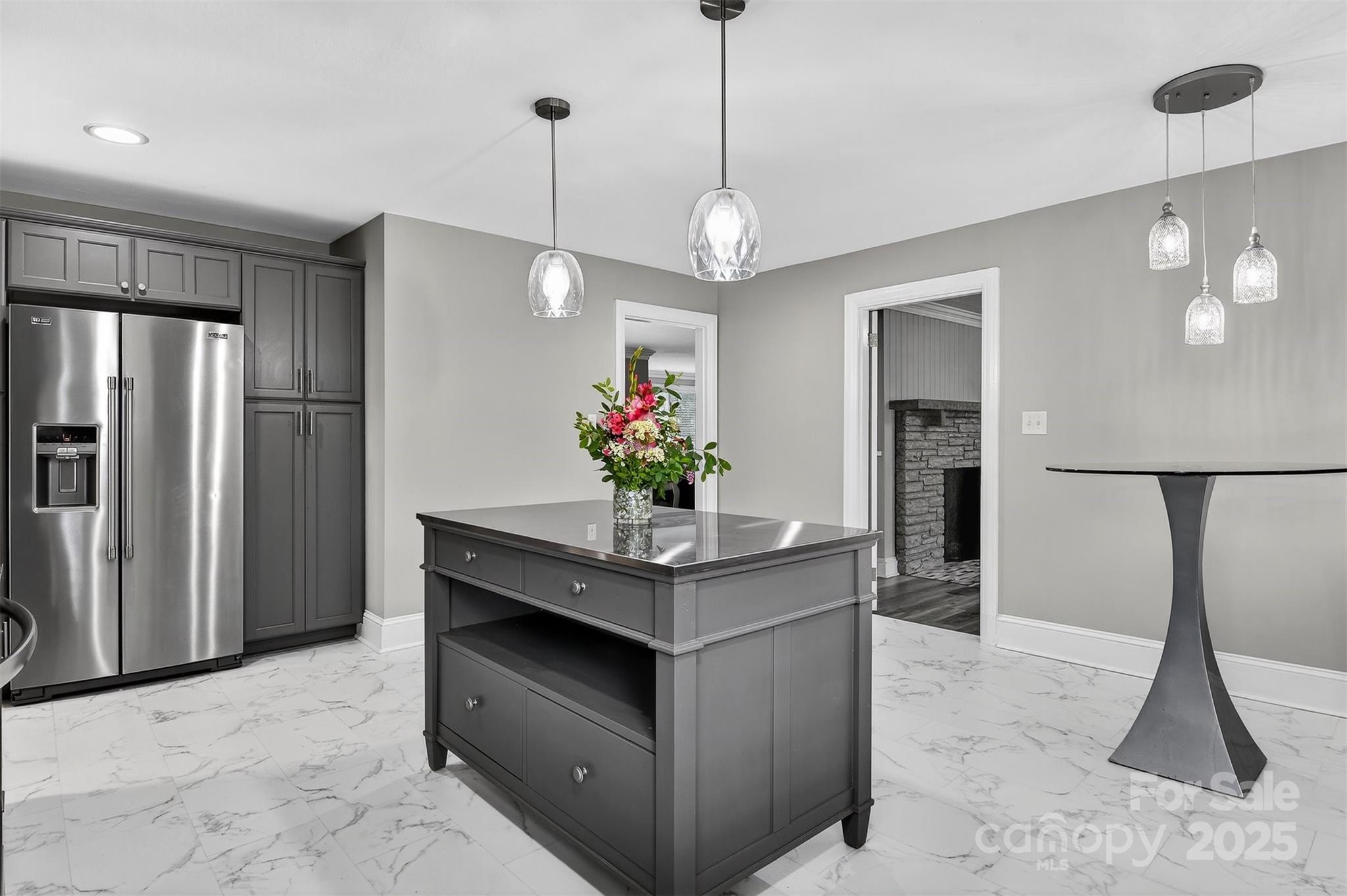 3127 North Center Street Hickory, NC 28601 - Photo 14 of 47 a kitchen with stainless steel appliances granite countertop a refrigerator a sink a stove and a refrigerator