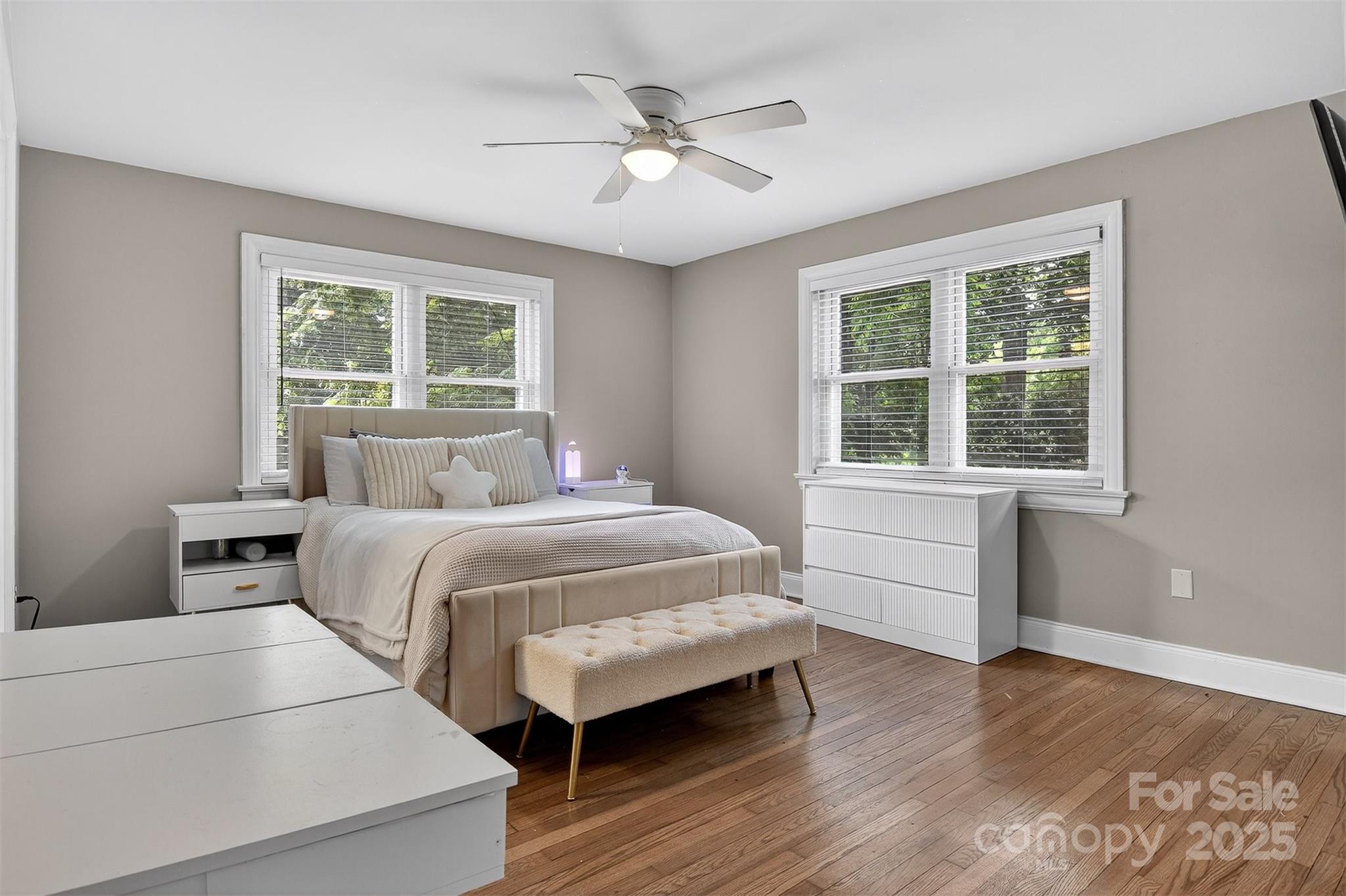 3127 North Center Street Hickory, NC 28601 - Photo 25 of 47 a bedroom with a large bed and a large window