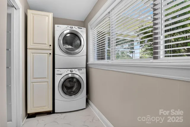 a utility room with a washer and dryer