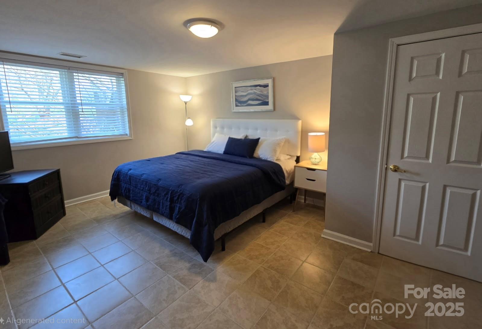 3127 North Center Street Hickory, NC 28601 - Photo 34 of 47 a bedroom with a bed and window