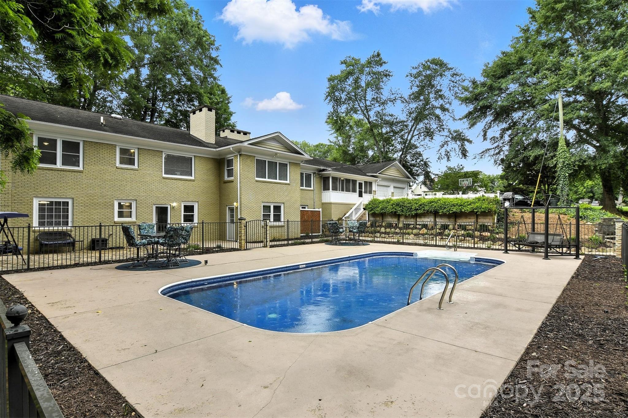 3127 North Center Street Hickory, NC 28601 - Photo 39 of 47 a view of a house with swimming pool and sitting area