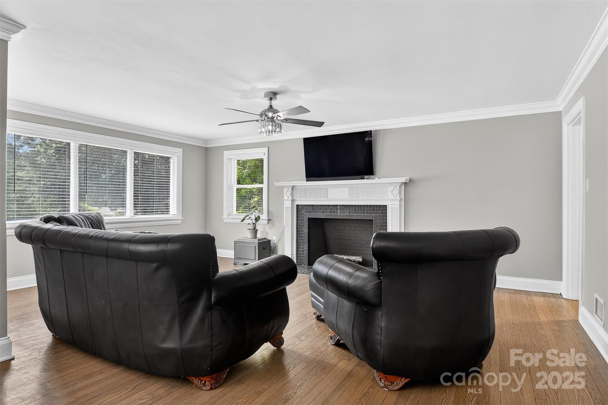 3127 North Center Street Hickory, NC 28601 - Photo 4 of 47 a living room with furniture and a fireplace