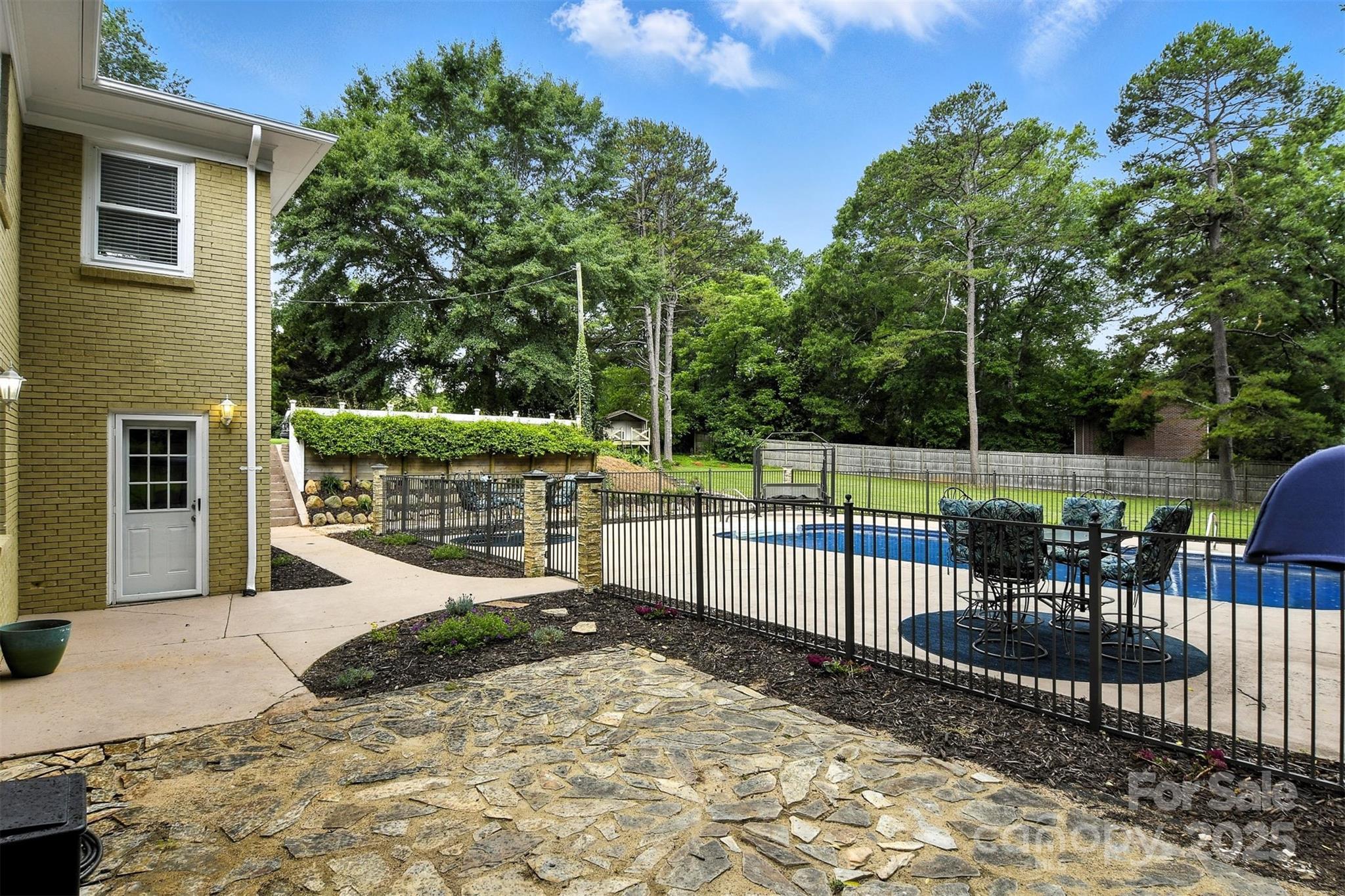 3127 North Center Street Hickory, NC 28601 - Photo 41 of 47 a view of a backyard with a sitting area
