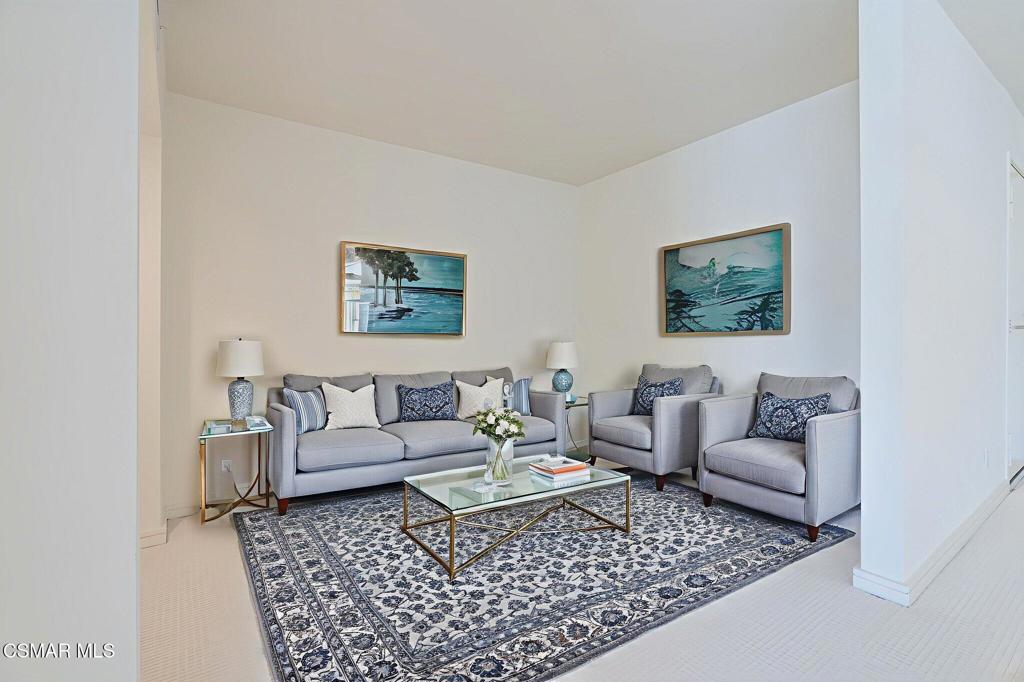 10660 Wilshire Boulevard, Unit 410 Los Angeles, CA 90024 - Photo 14 of 85 a living room with furniture and a rug