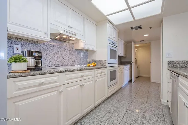 a view of a hallway with closet