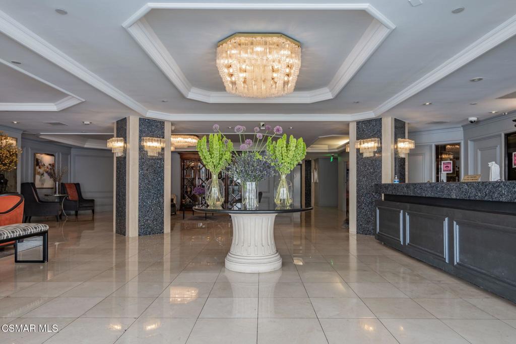 10660 Wilshire Boulevard, Unit 410 Los Angeles, CA 90024 - Photo 4 of 85 a view of a lobby with furniture and floor to ceiling window