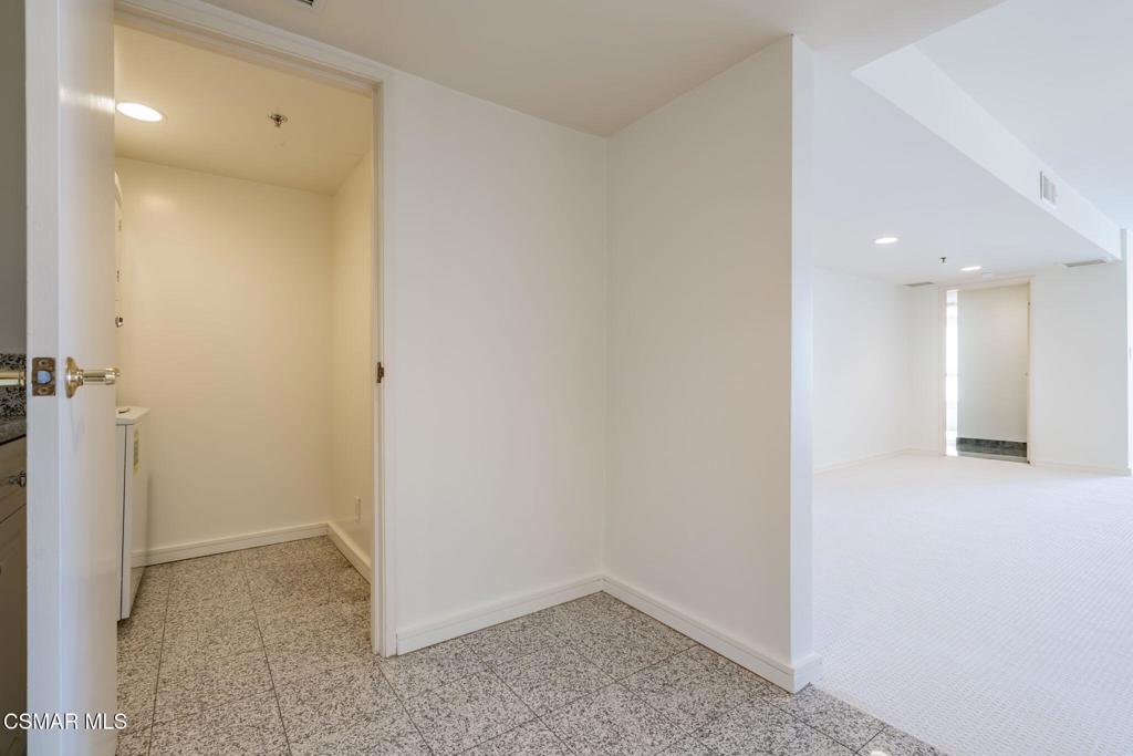10660 Wilshire Boulevard, Unit 410 Los Angeles, CA 90024 - Photo 64 of 85 a view of a hallway with closet
