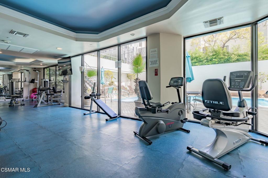 10660 Wilshire Boulevard, Unit 410 Los Angeles, CA 90024 - Photo 75 of 85 a view of a workspace with gym equipment