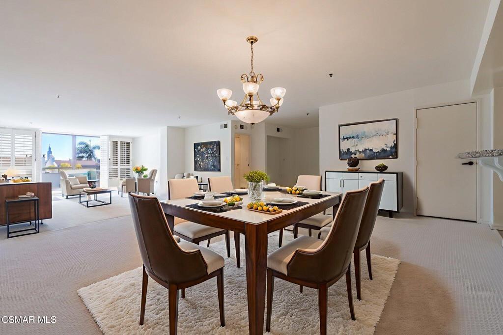 10660 Wilshire Boulevard, Unit 410 Los Angeles, CA 90024 - Photo 9 of 85 a view of a dining room with furniture and wooden floor