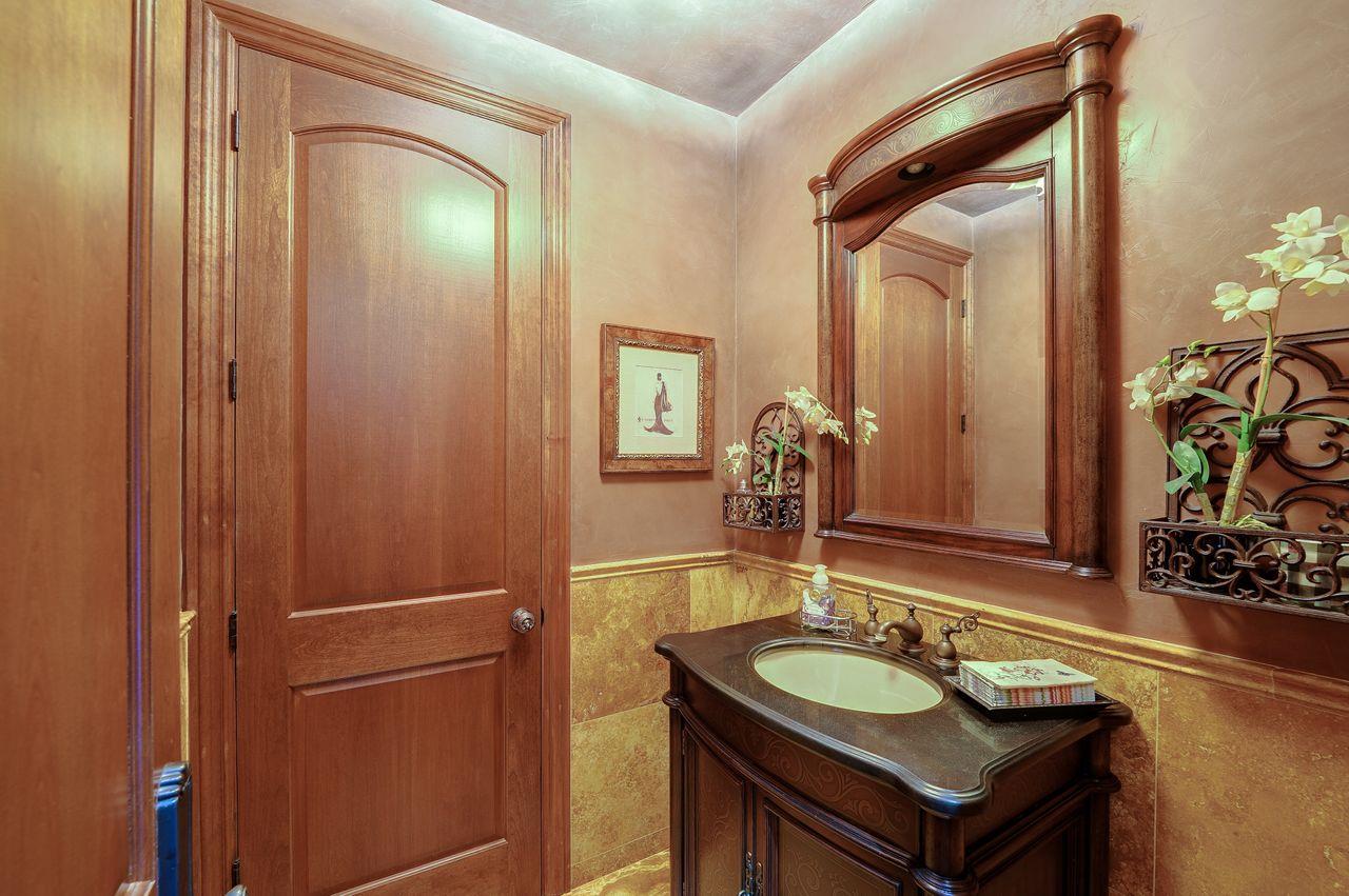 5000 Hecker Pass Road Gilroy, CA 95020 - Photo 41 of 100 a bathroom with a sink and a mirror