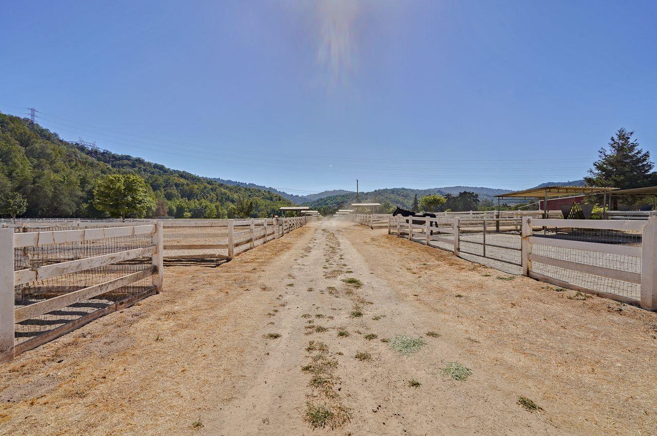 5000 Hecker Pass Road Gilroy, CA 95020 - Photo 68 of 100 a view of a dry yard with wooden fence