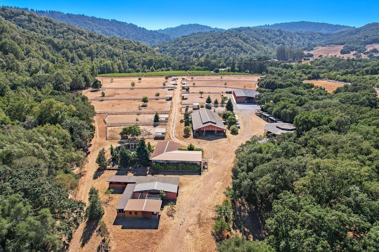 5000 Hecker Pass Road Gilroy, CA 95020 - Photo 82 of 100 an aerial view of residential house with outdoor space and mountain view