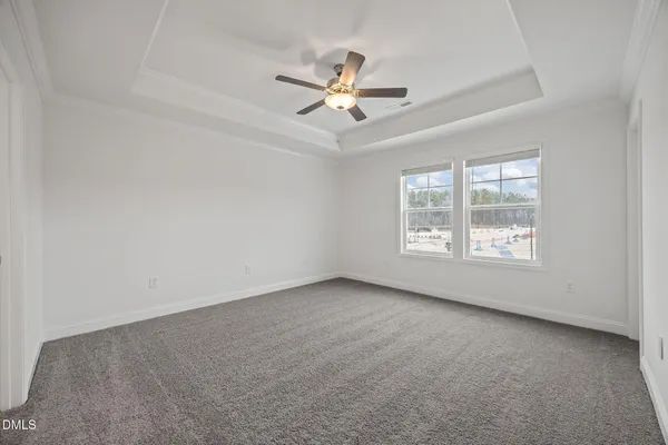 an empty room with a empty space and a window