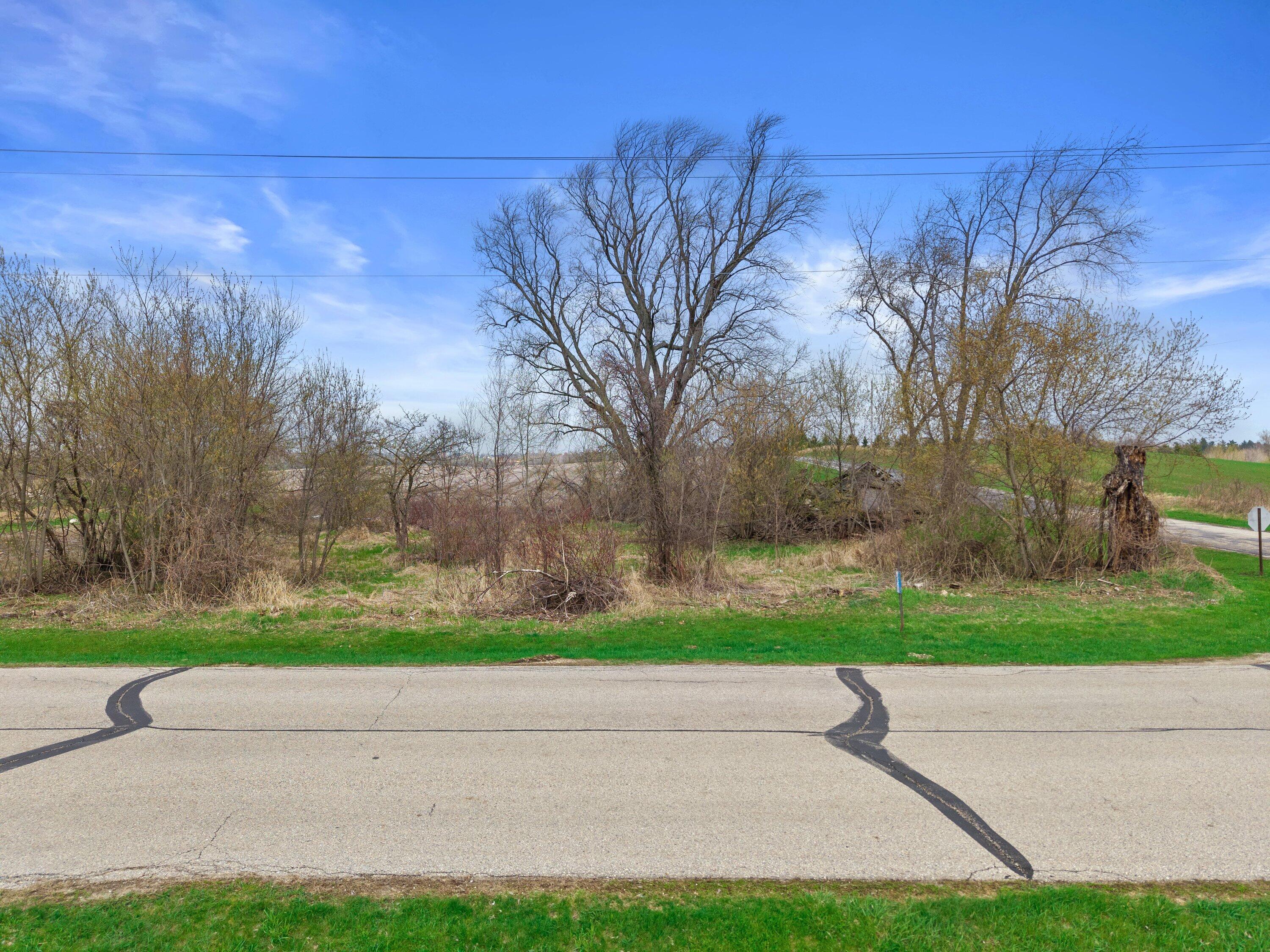 W5038 Beaver Dam Road West Bend, WI 53090 - Photo 2 of 2 Use old schoolhouse foundation!