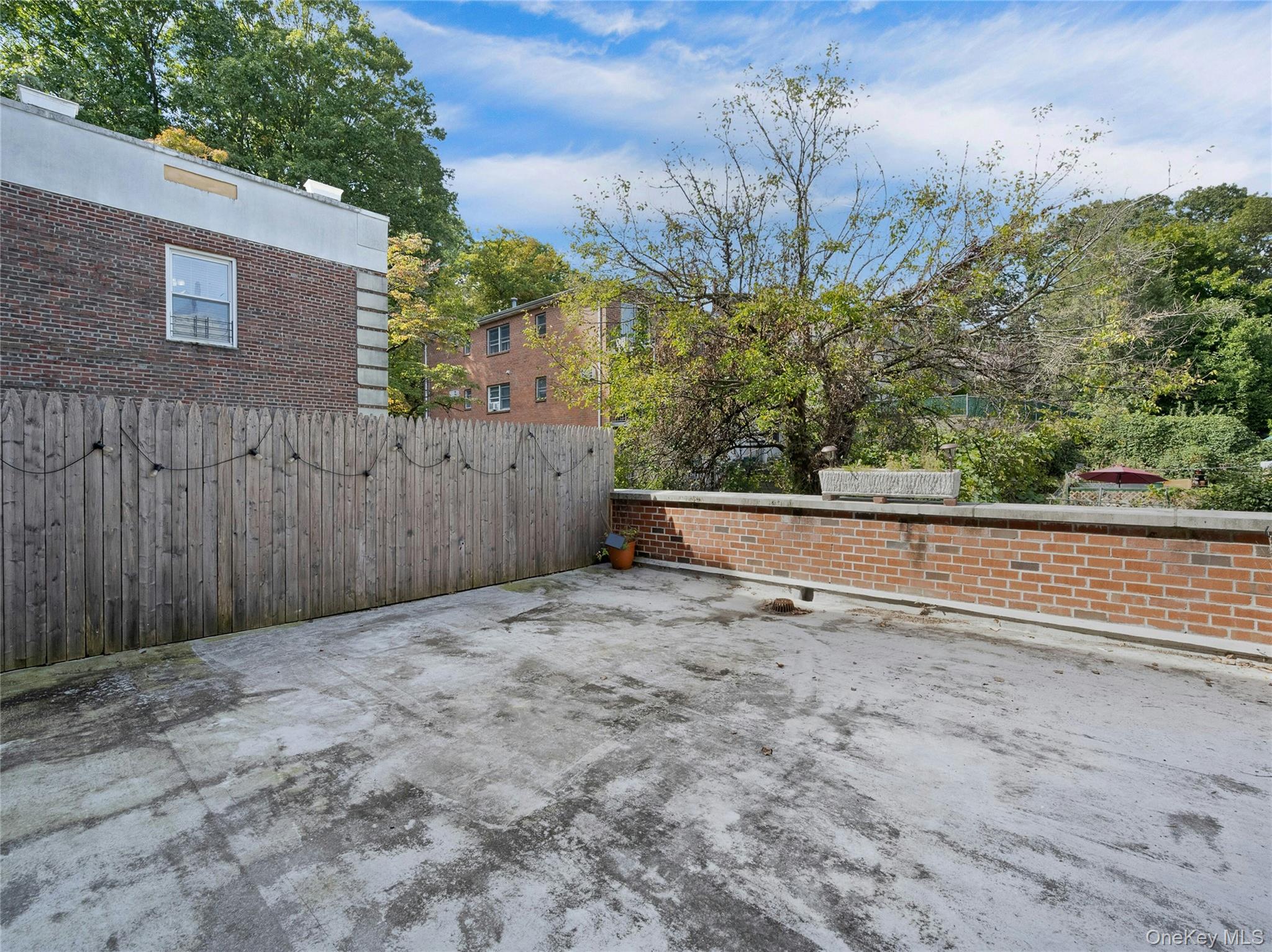 764 Palmer Road, Unit 1B Bronxville, NY 10708 - Photo 26 of 29 a view of a backyard