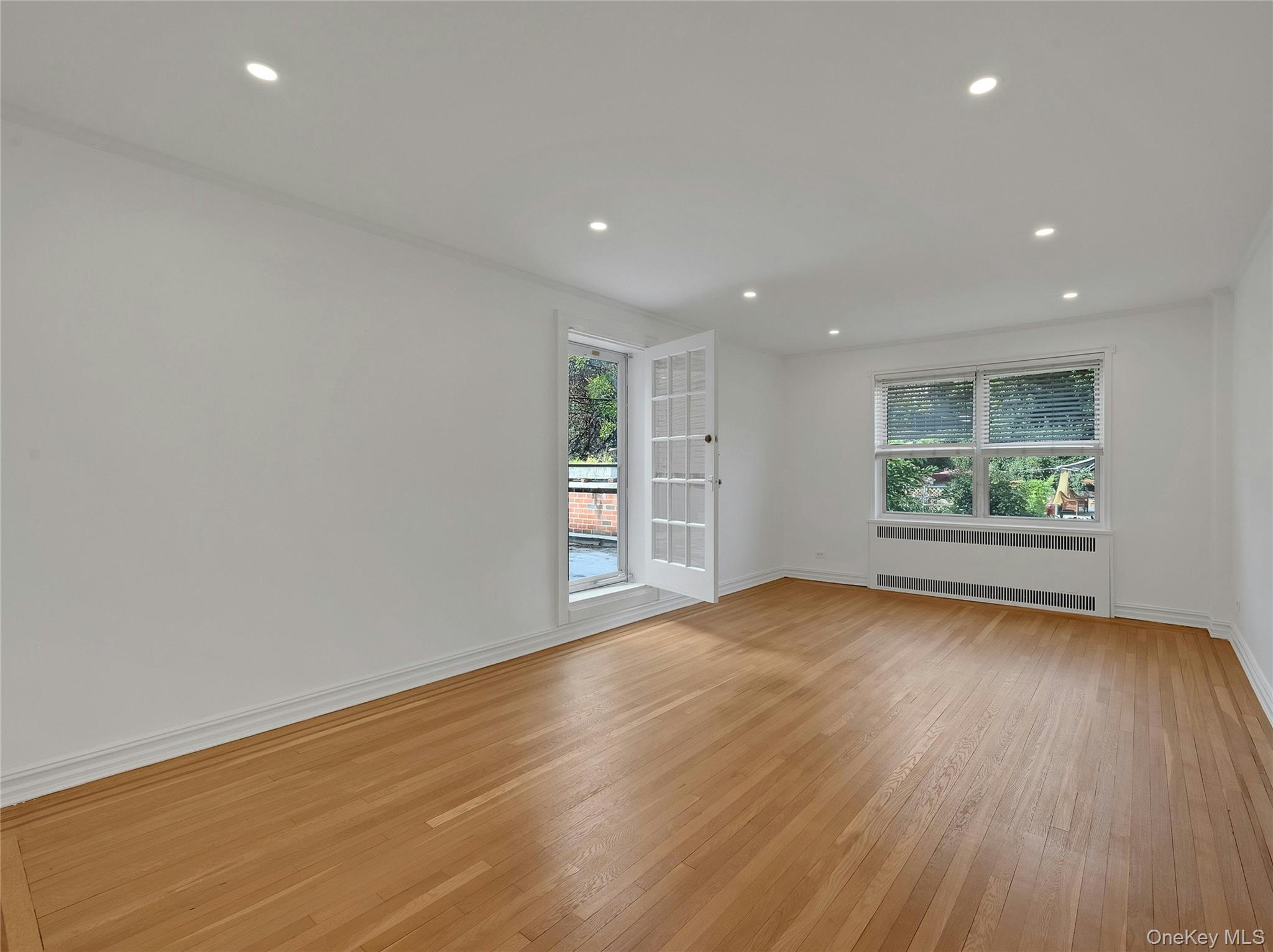 764 Palmer Road, Unit 1B Bronxville, NY 10708 - Photo 4 of 29 an empty room with window