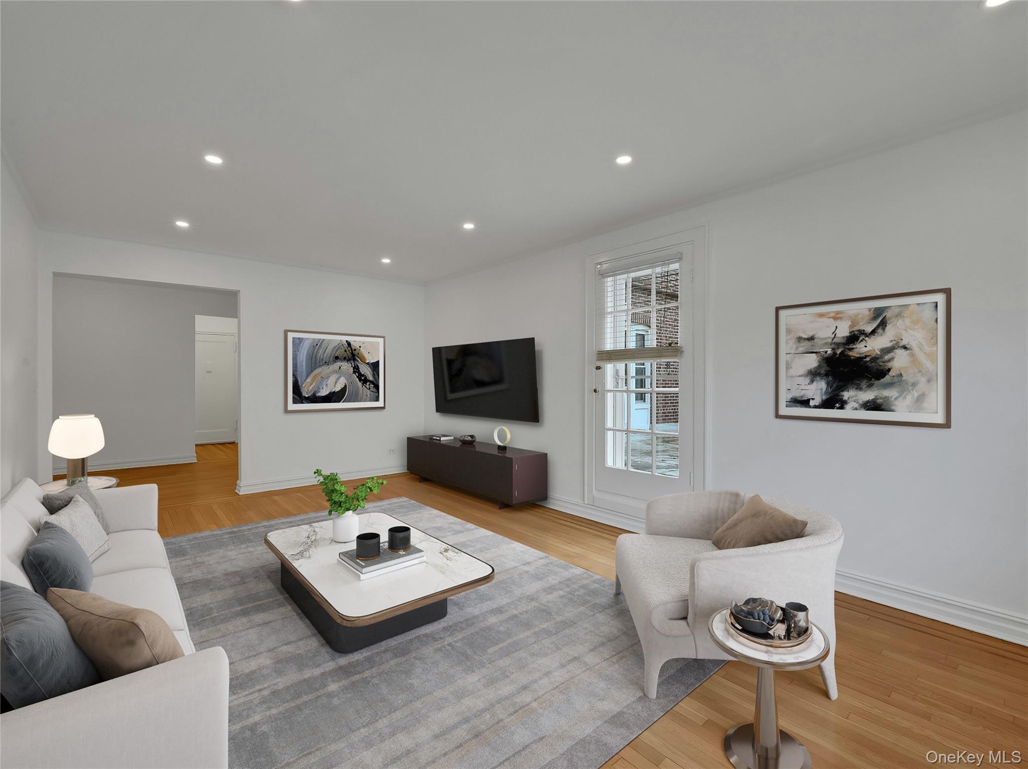 764 Palmer Road, Unit 1B Bronxville, NY 10708 - Photo 5 of 29 a living room with furniture and a flat screen tv