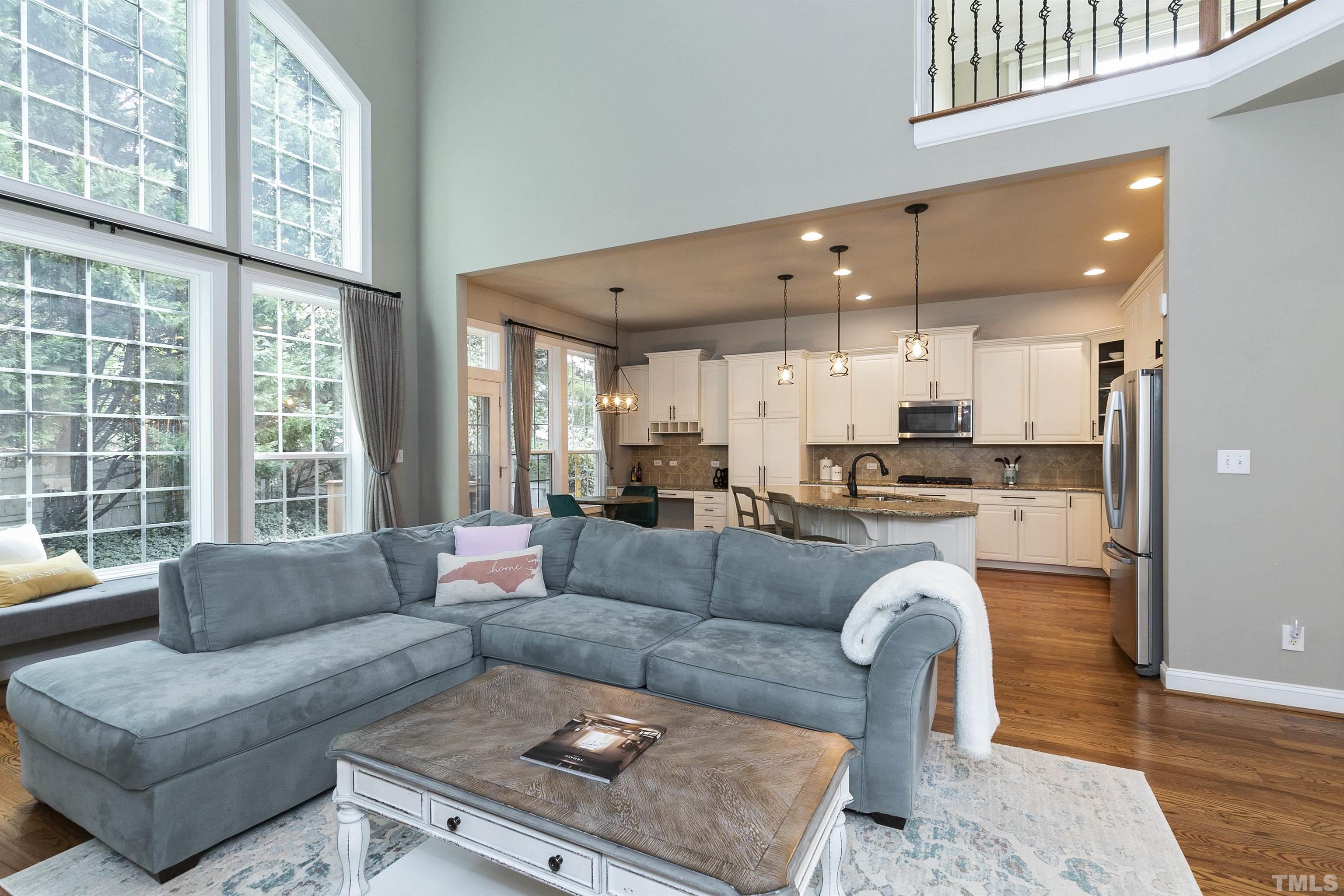 2255 Clayette Court Raleigh, NC 27612 - Photo 12 of 59 a living room with furniture and a large window