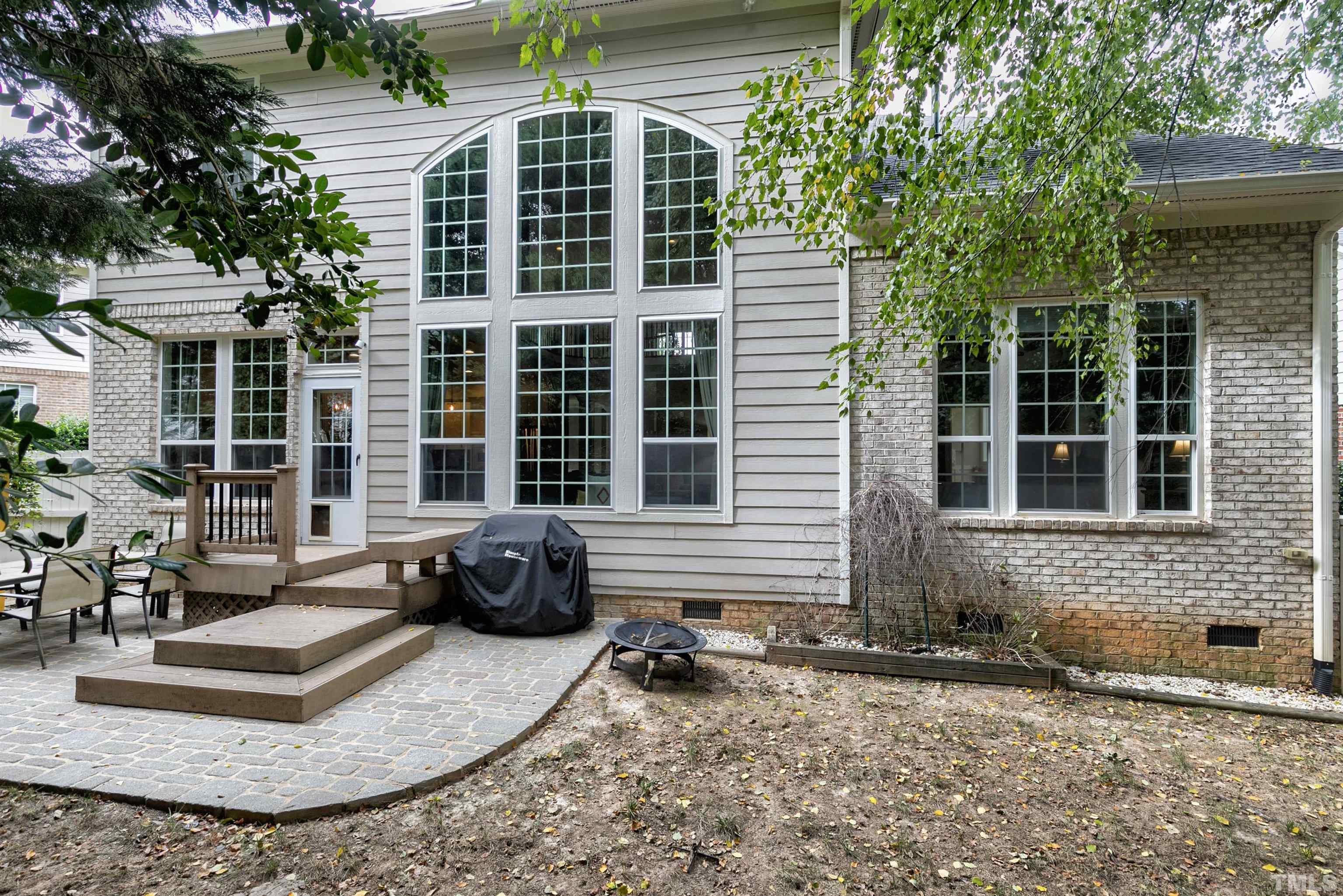 2255 Clayette Court Raleigh, NC 27612 - Photo 49 of 59 a front view of a house with a garden
