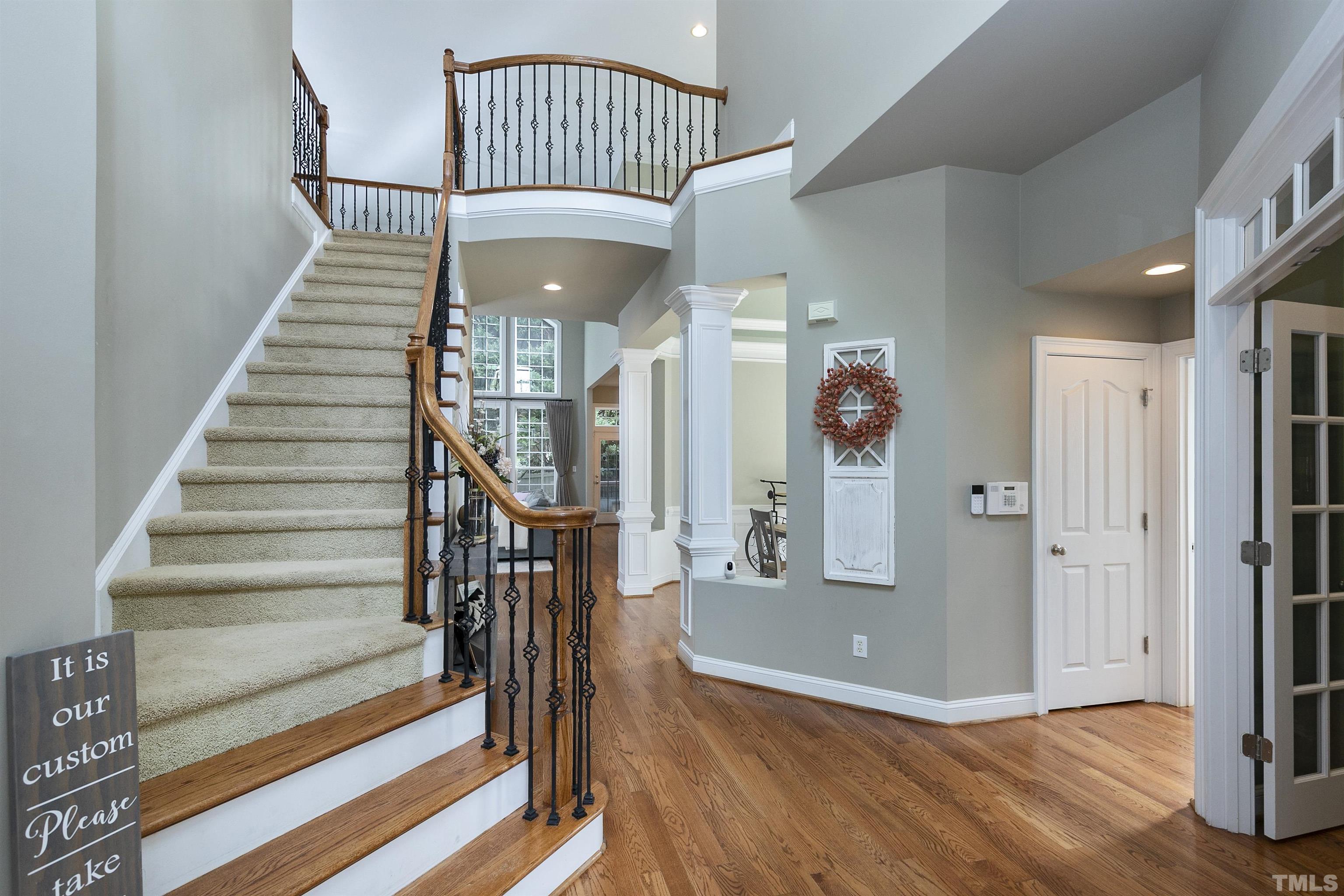 2255 Clayette Court Raleigh, NC 27612 - Photo 8 of 59 a view of entryway and hall with wooden floor