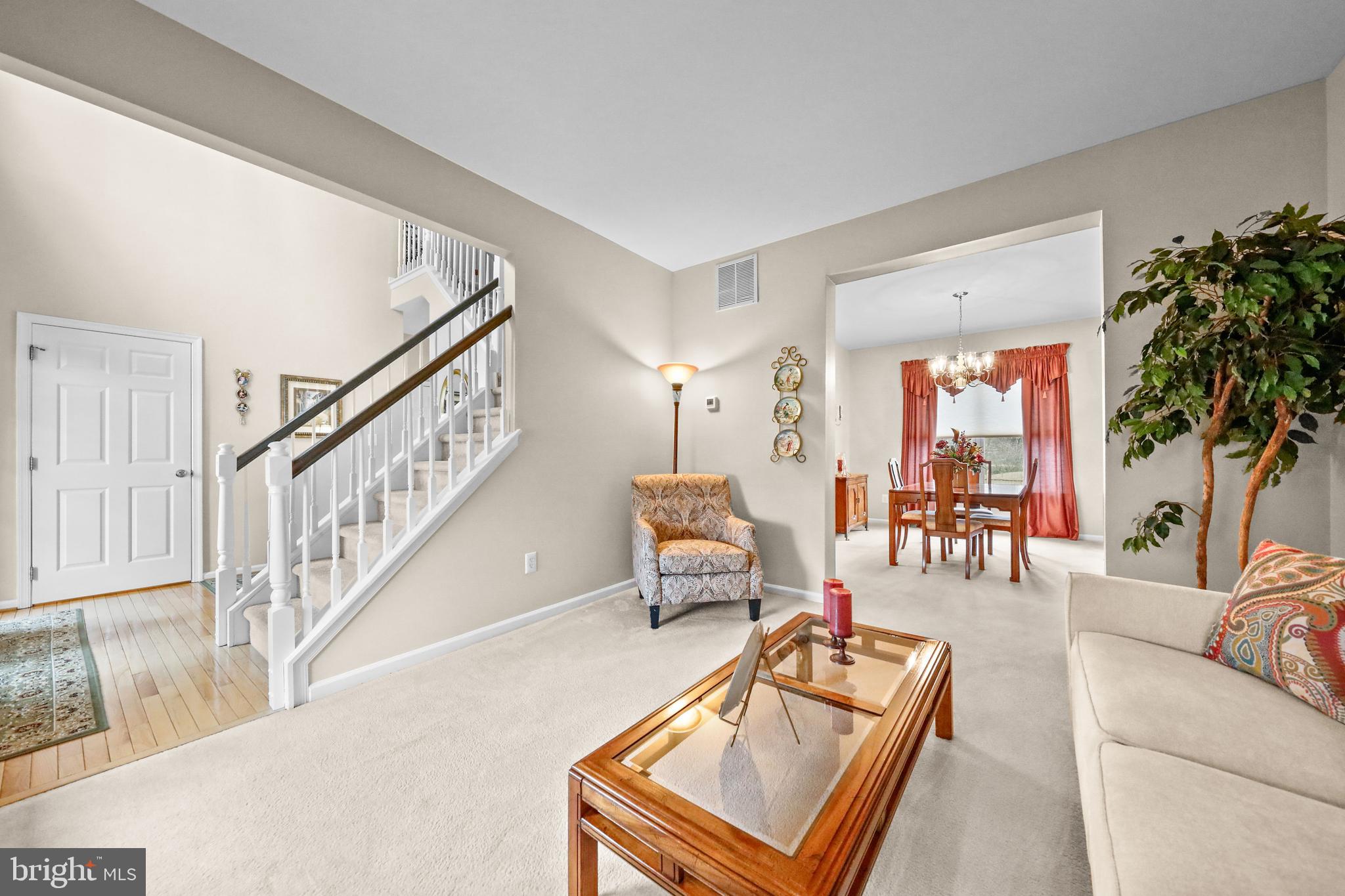 7 Colts Gait Road Evesham, NJ 08053 - Photo 16 of 47 a living room with furniture and a table