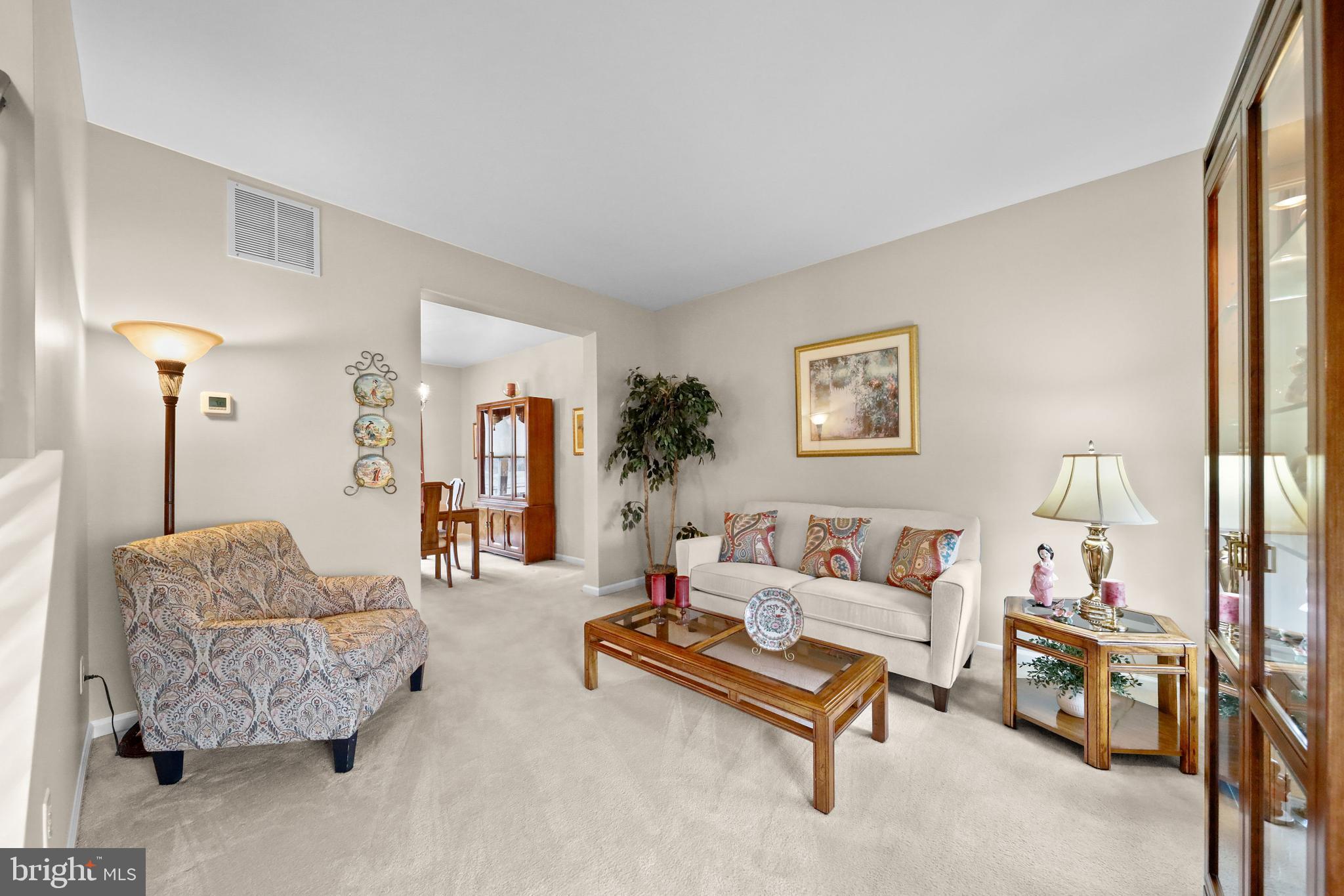 7 Colts Gait Road Evesham, NJ 08053 - Photo 18 of 47 a living room with furniture and a lamp