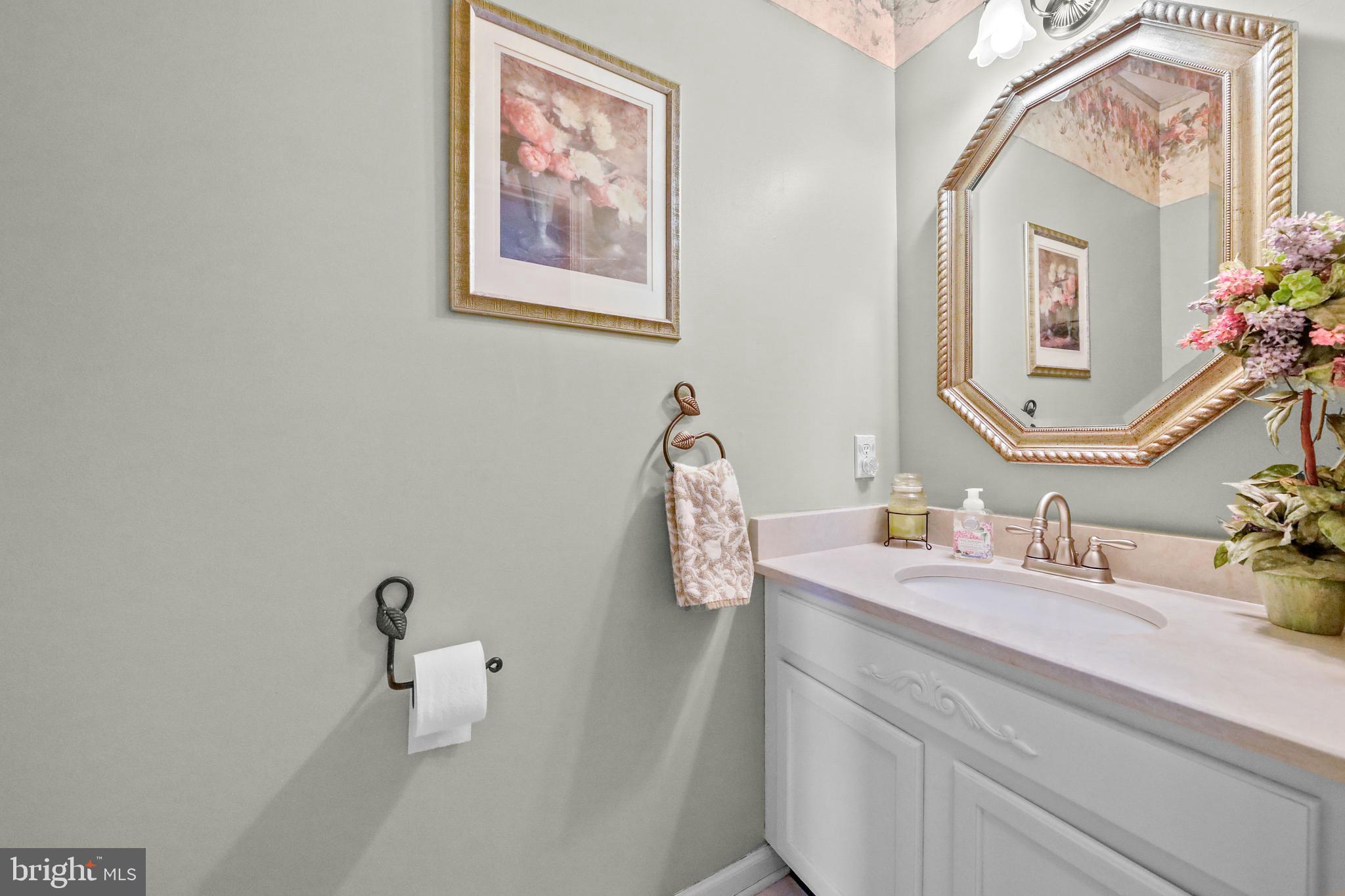 7 Colts Gait Road Evesham, NJ 08053 - Photo 19 of 47 a bathroom with a sink and a mirror
