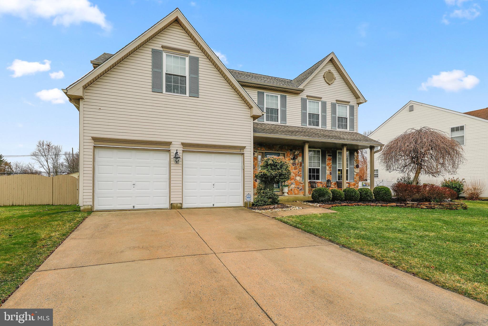 7 Colts Gait Road Evesham, NJ 08053 - Photo 2 of 47 a front view of a house with a garden