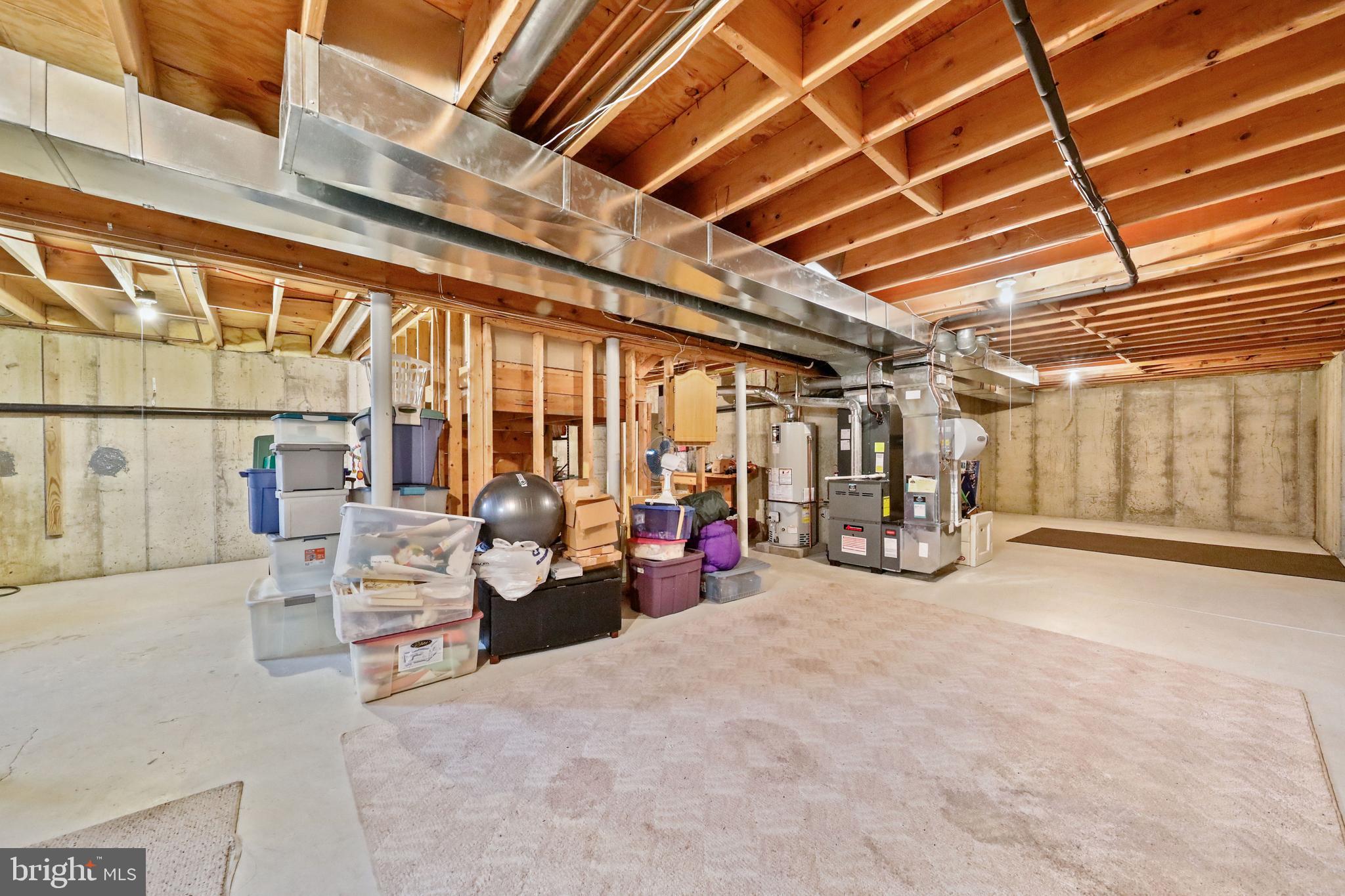 7 Colts Gait Road Evesham, NJ 08053 - Photo 35 of 47 a view of a garage with table and chairs