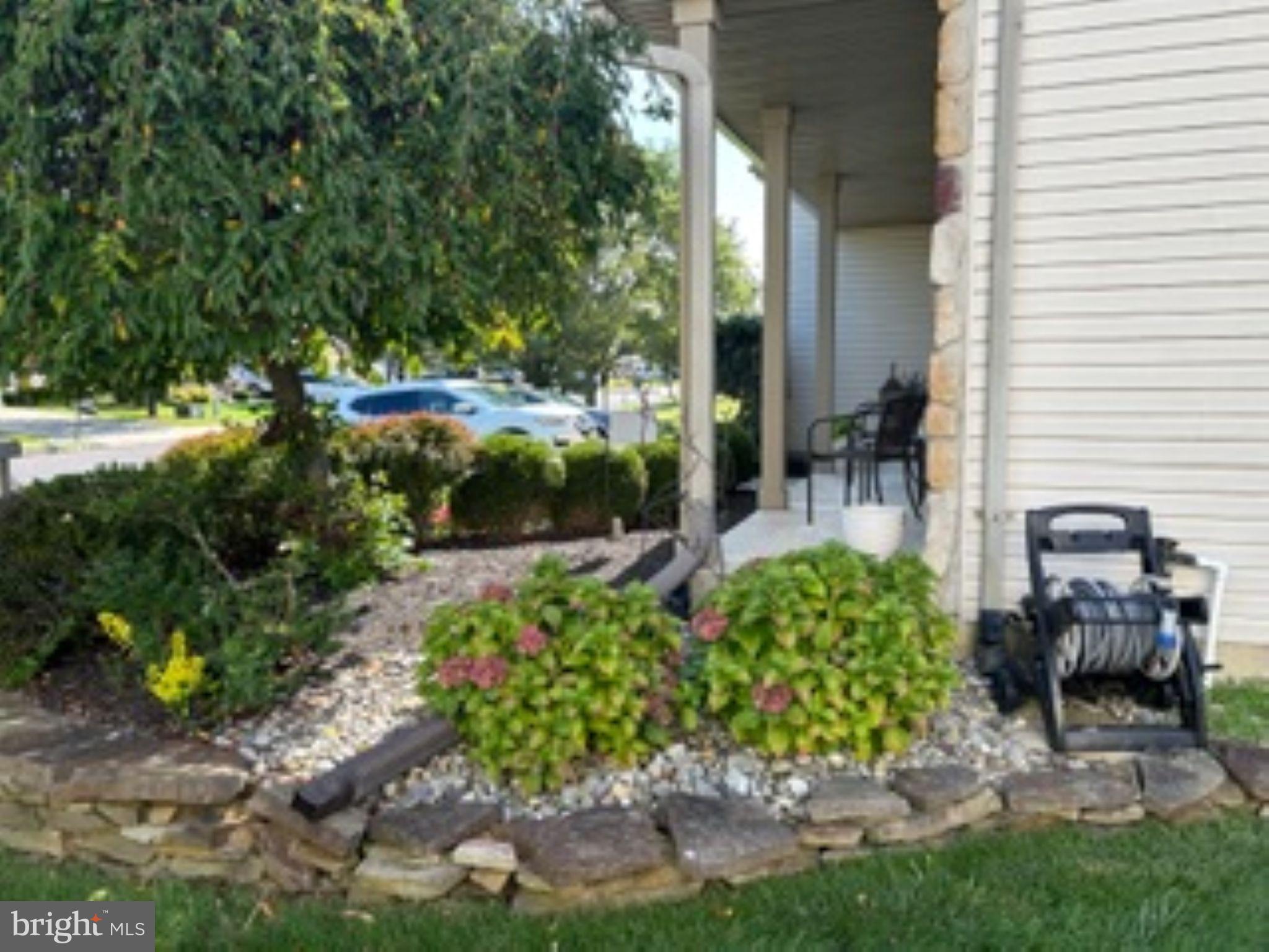 7 Colts Gait Road Evesham, NJ 08053 - Photo 42 of 47 a front view of a house with a yard and sitting area