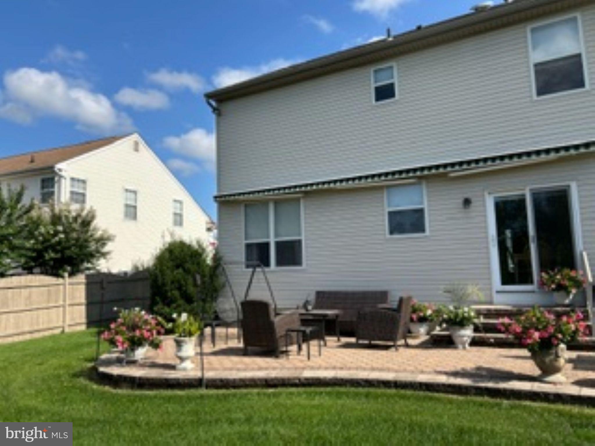 7 Colts Gait Road Evesham, NJ 08053 - Photo 45 of 47 a view of a house with backyard and sitting area