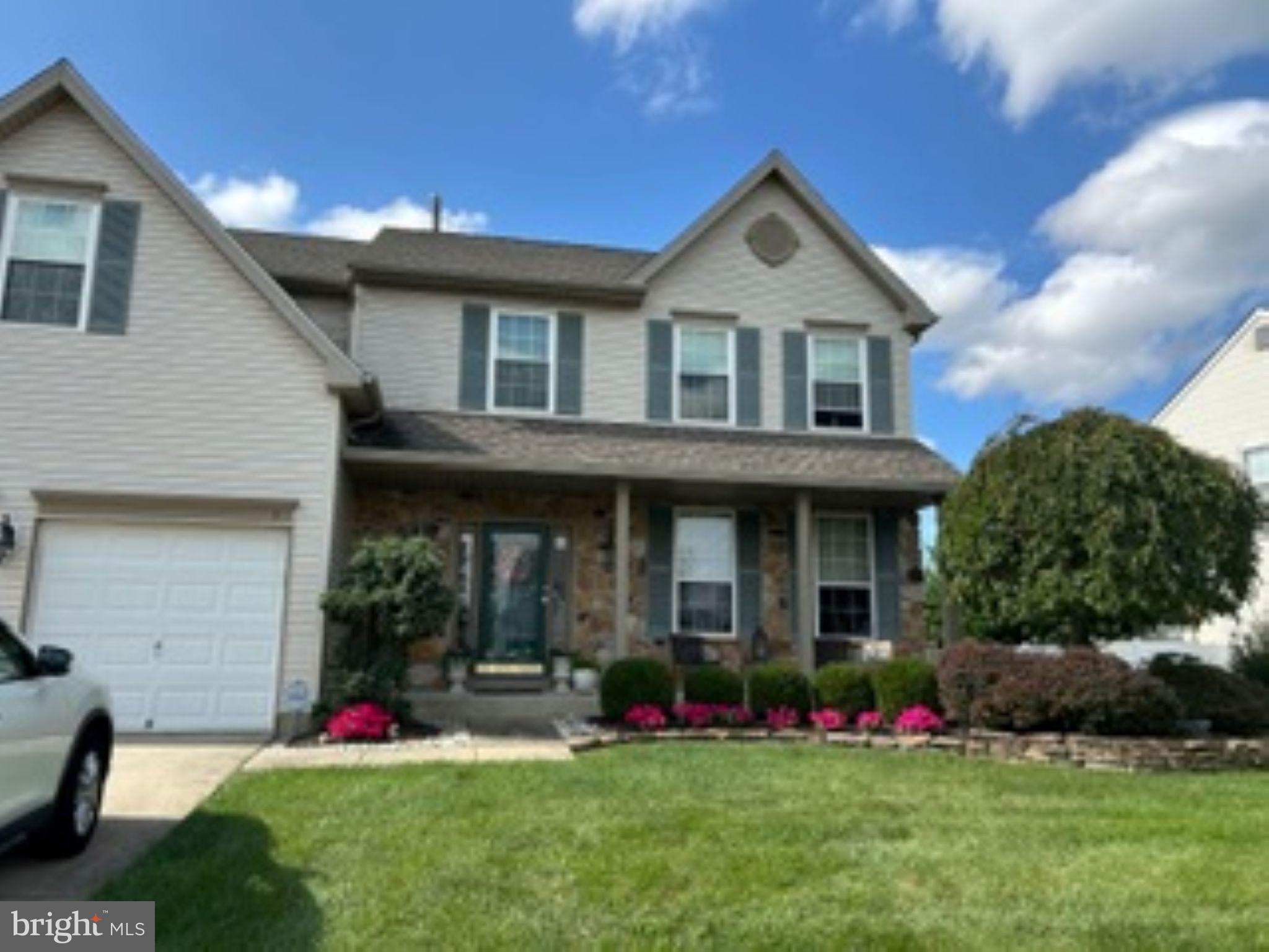 7 Colts Gait Road Evesham, NJ 08053 - Photo 47 of 47 a front view of a house with a yard and trees