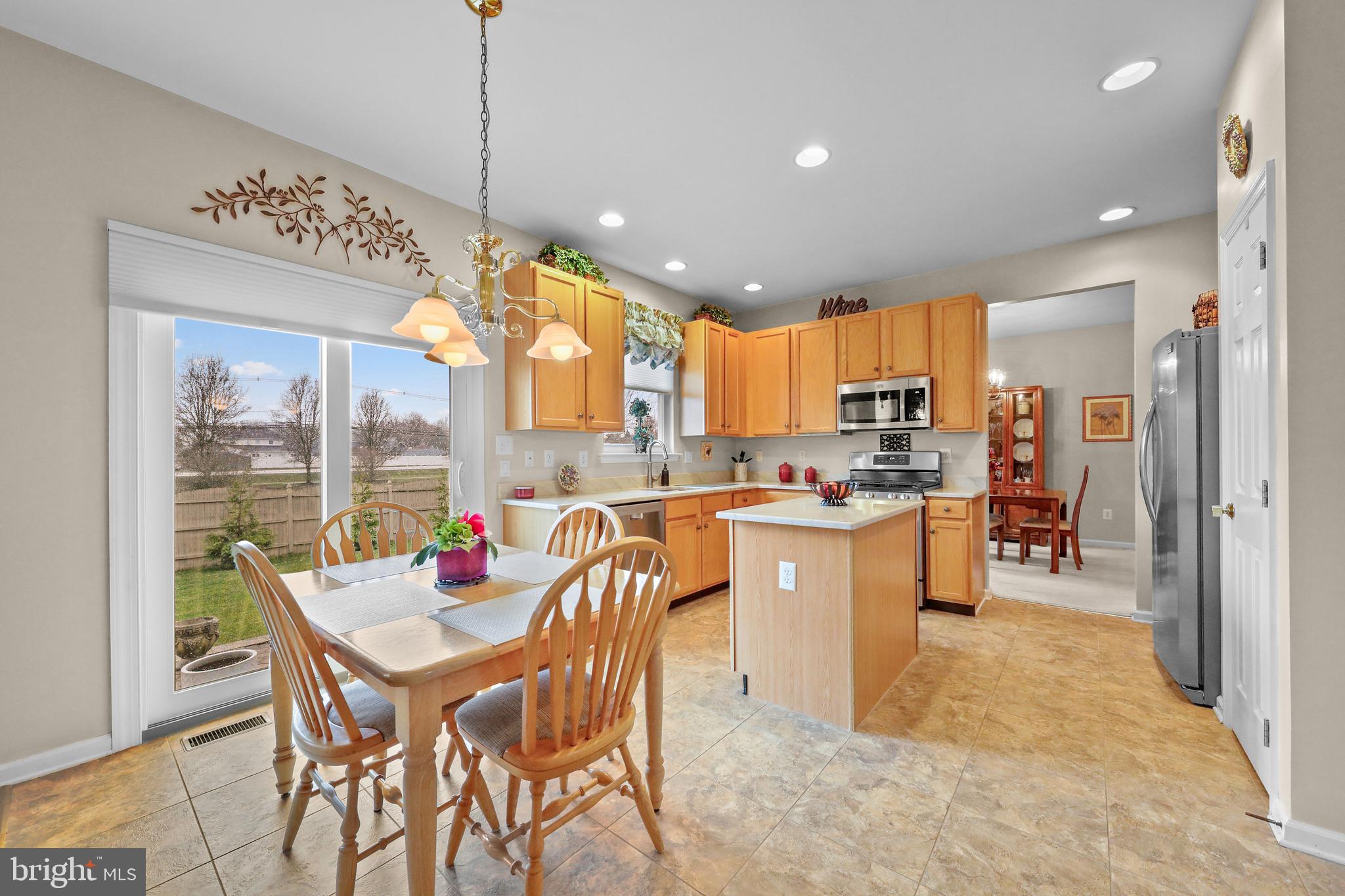 7 Colts Gait Road Evesham, NJ 08053 - Photo 5 of 47 a kitchen with stainless steel appliances kitchen island granite countertop a sink and cabinets