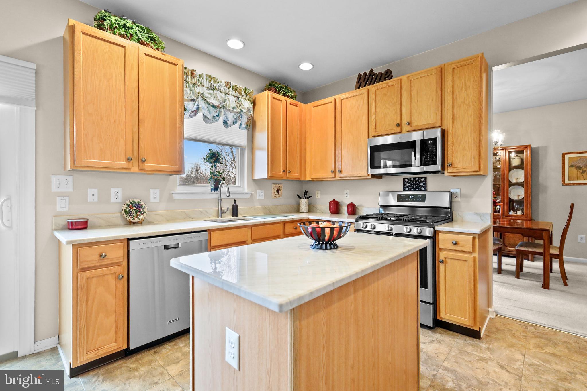 7 Colts Gait Road Evesham, NJ 08053 - Photo 6 of 47 a kitchen with a sink a stove a refrigerator cabinets and a window