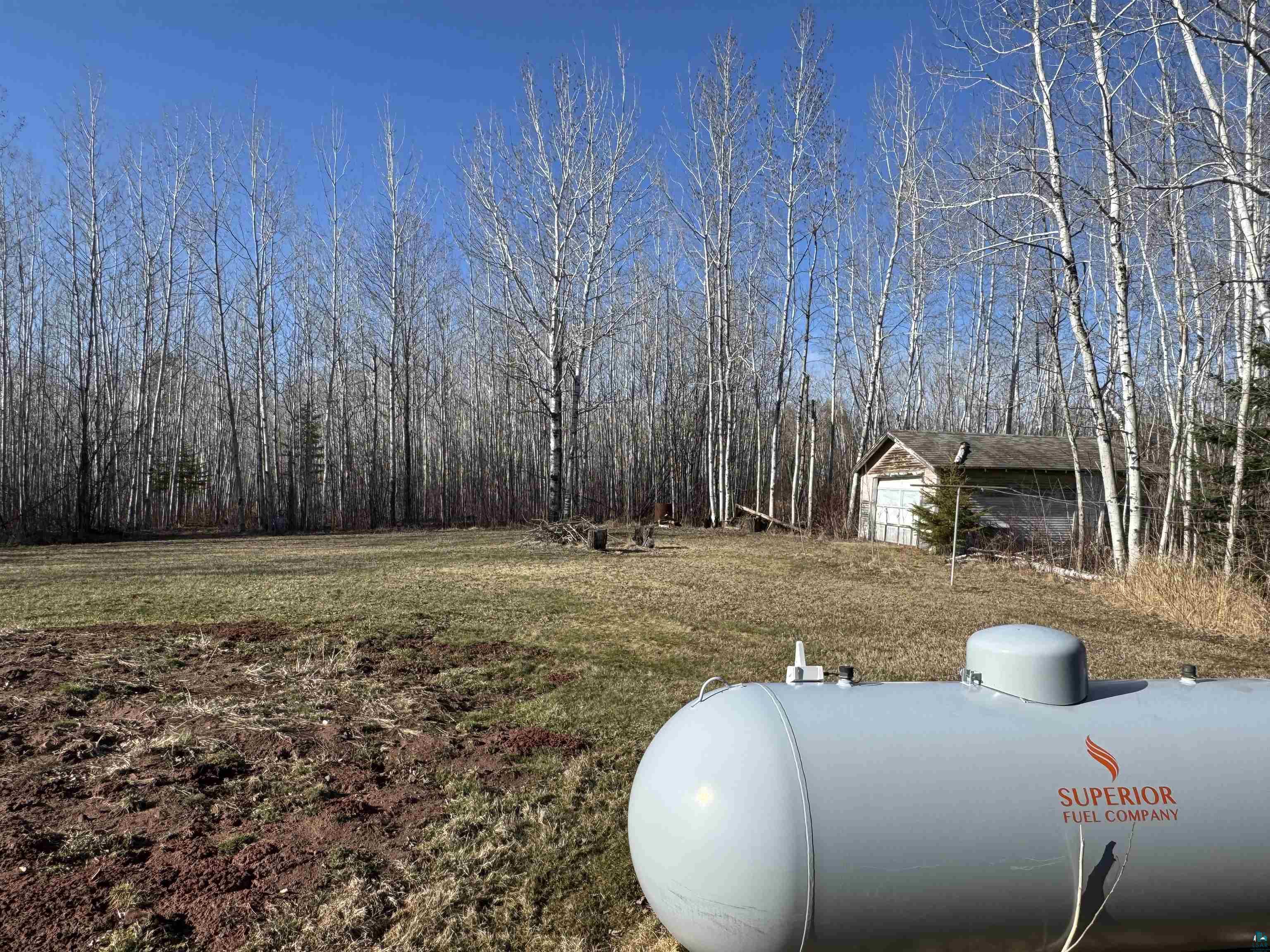 5133 East County Rd C Superior, WI 54880 - Photo 14 of 16 View of yard featuring a wooded view