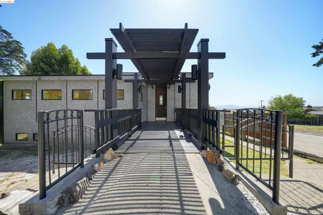 a view of a balcony with wooden floor