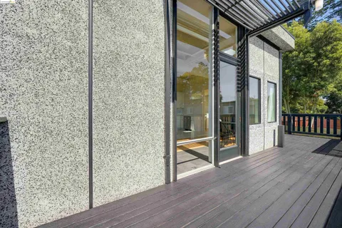 a view of a glass door and porch