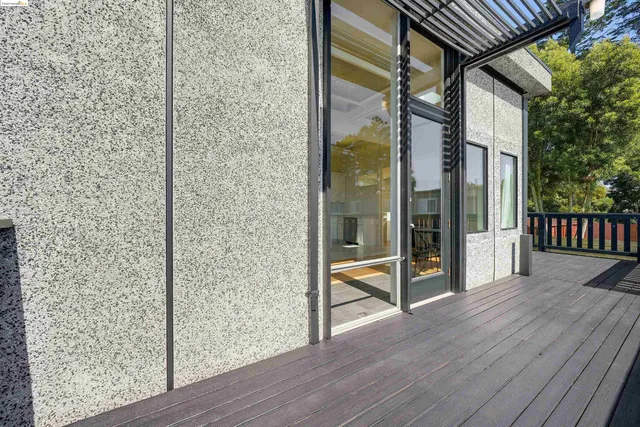 a view of a glass door and porch