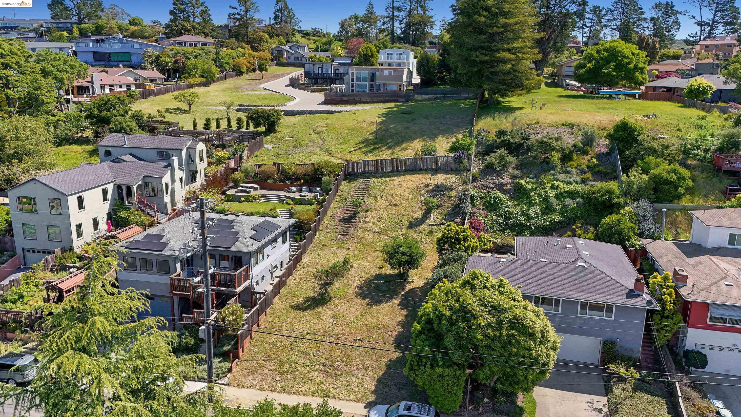 921 Clark Place El Cerrito, CA 94530 - Photo 13 of 36 an aerial view of residential houses with outdoor space and swimming pool