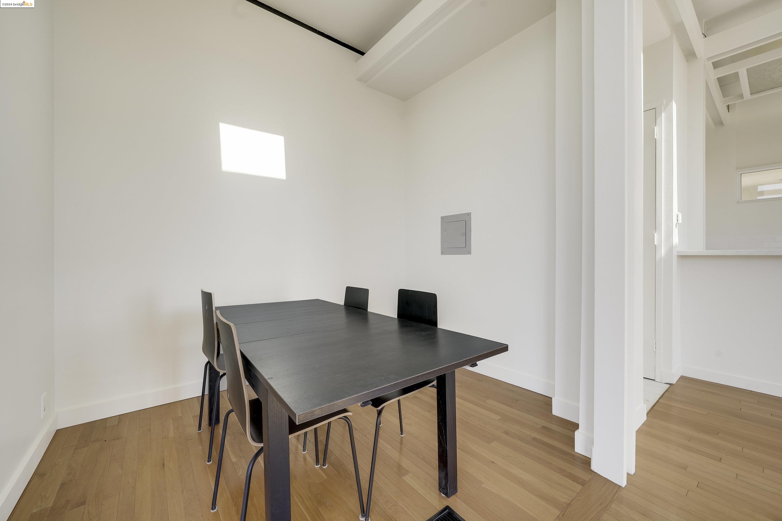 921 Clark Place El Cerrito, CA 94530 - Photo 16 of 36 a view of a workspace with furniture and wooden floor