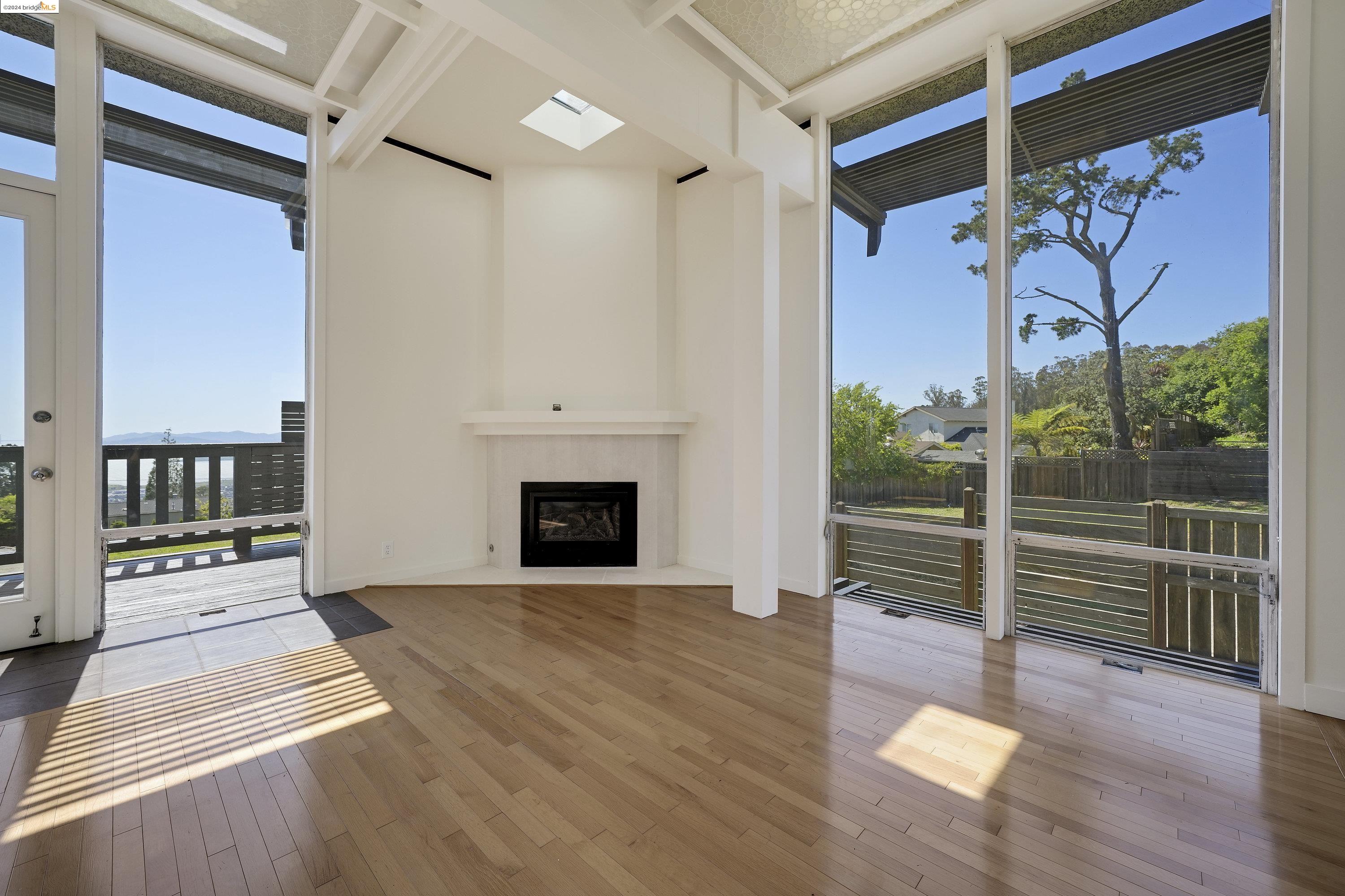 921 Clark Place El Cerrito, CA 94530 - Photo 18 of 36 a view of a porch with wooden floor and fence
