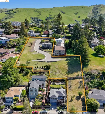 a view of a city with lawn chairs