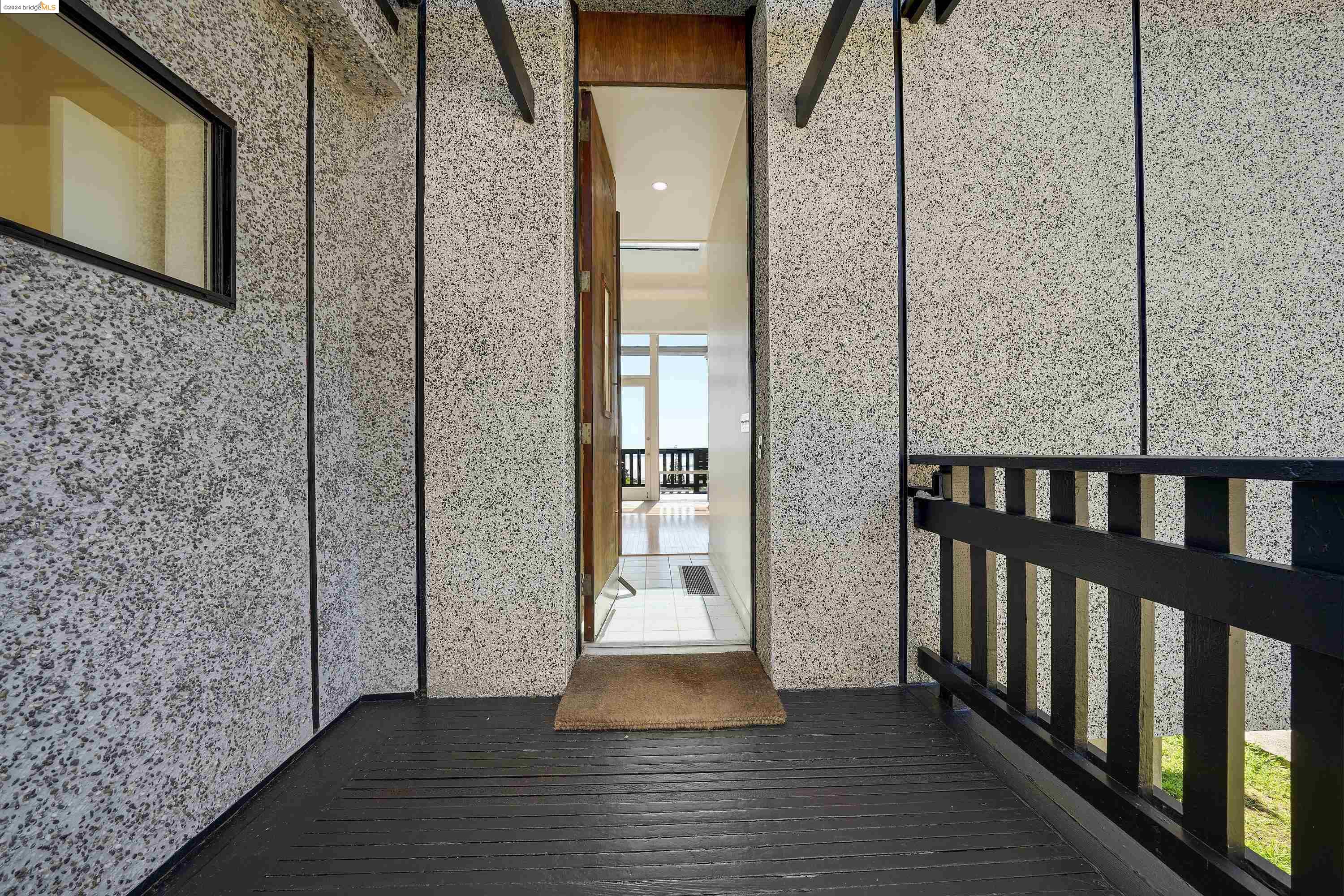 921 Clark Place El Cerrito, CA 94530 - Photo 10 of 36 a view of a balcony with wooden floor