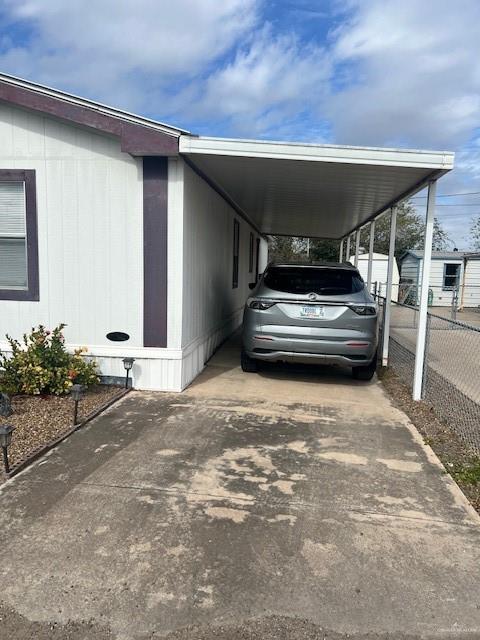 215 South Valley View Road, Unit 34 Donna, TX 78537 - Photo 2 of 24 a view of car parked in garage