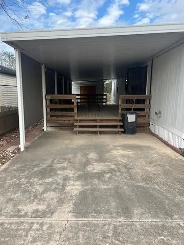 a view of outdoor space with stairs and furniture