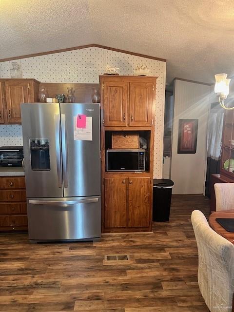 215 South Valley View Road, Unit 34 Donna, TX 78537 - Photo 9 of 24 a kitchen with stainless steel appliances granite countertop a refrigerator a stove and a refrigerator