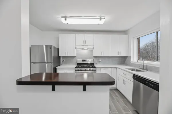 $299,000 | 10607 Weymouth Street, Unit W201, Bethesda, MD 20814
