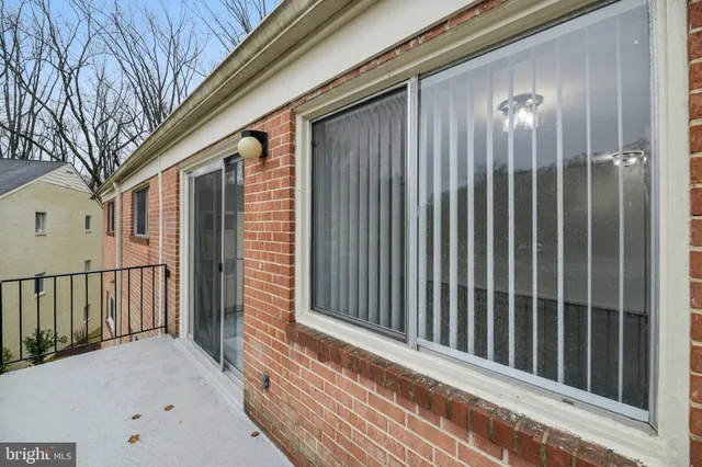 a view of a balcony with staircase